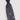 Navy blue tie with a swirling pattern of small white dots on a light gray background