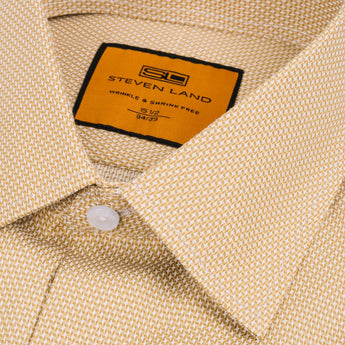 Close up of modern collar on light brown dress shirt