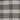 Close up of fabric with black plaid pattern 