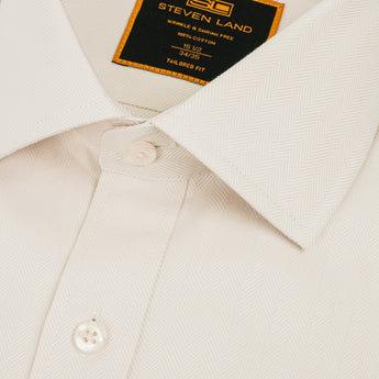 Close up of herringbone texture on dress shirt's spread collar