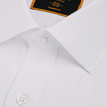 Close up of herringbone weave texture on white dress shirt's spread collar